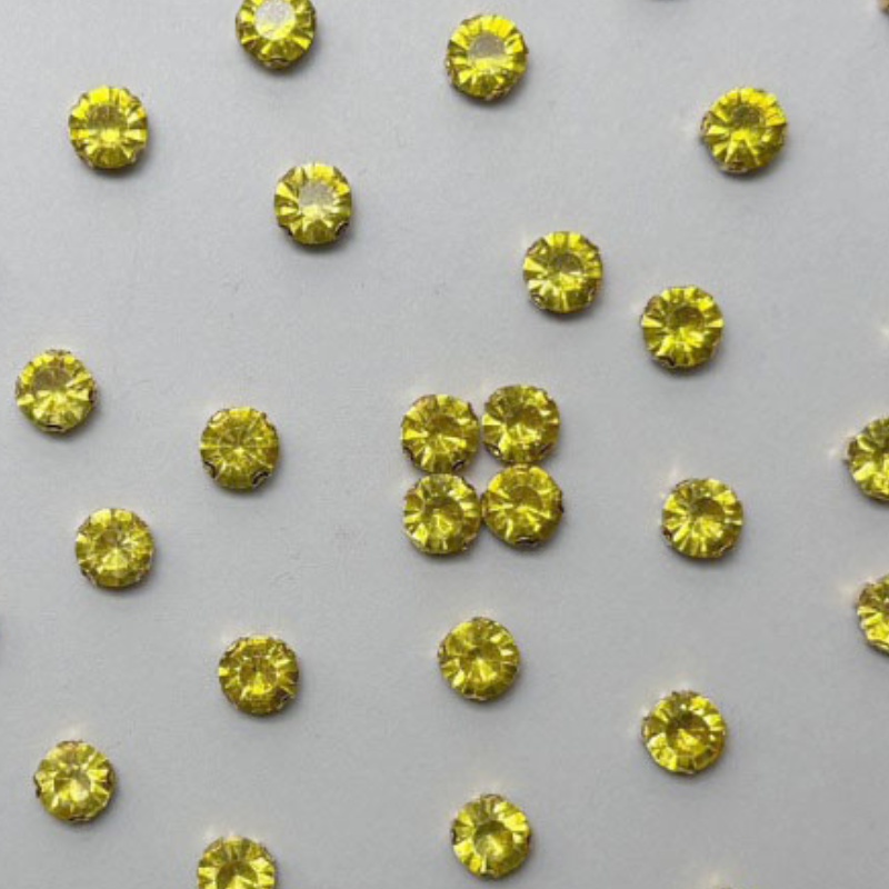 Yellow Round Crystal with Gold Claw Setting