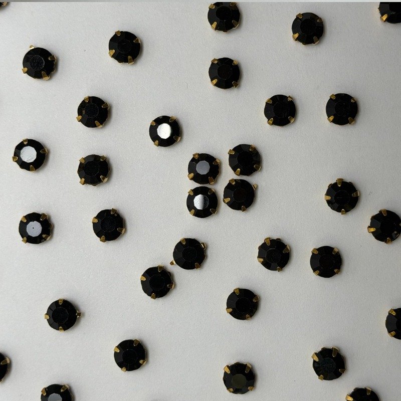 Black Round Crystal with Gold Claw Setting