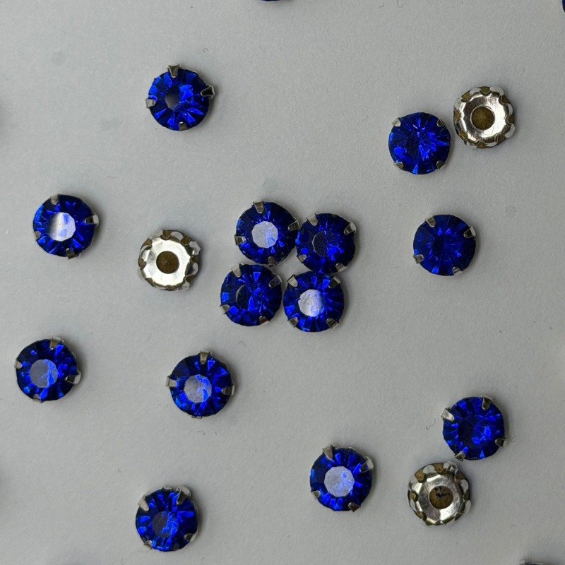 Blue Round Crystal with Silver Claw Setting