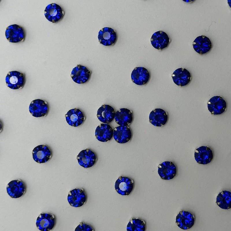 Blue Round Crystal with Silver Claw Setting
