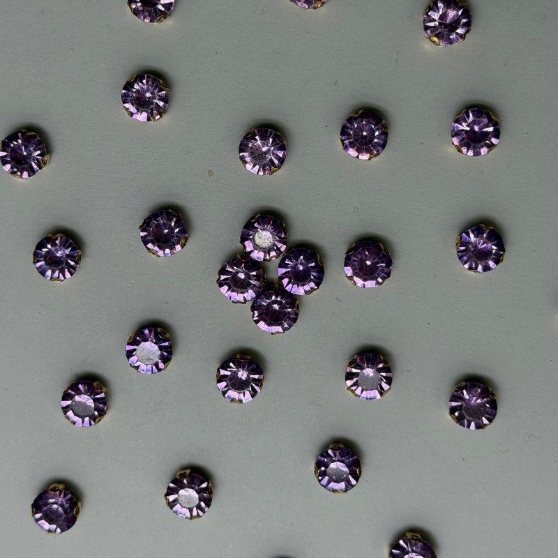 Purple Round Crystal with Gold Claw Setting